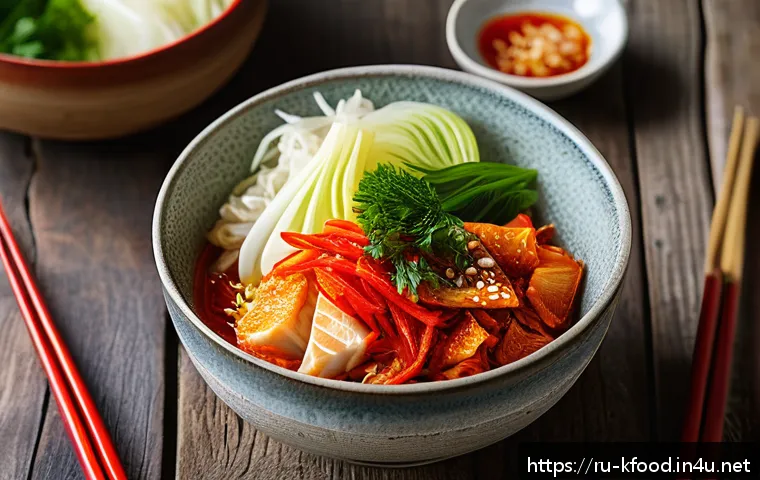 한식 김치 종류와 영양 정보 - A vibrant, close-up image of a traditional kimchi bowl featuring napa cabbage, bright red chili flak...